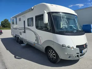 Rapido 10000 design edition *alde *queensbed *ac *taksäng 2013