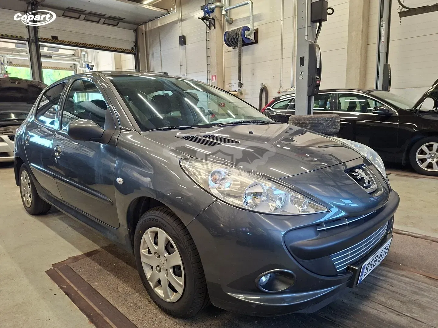 Peugeot 206 + 1.4 2012