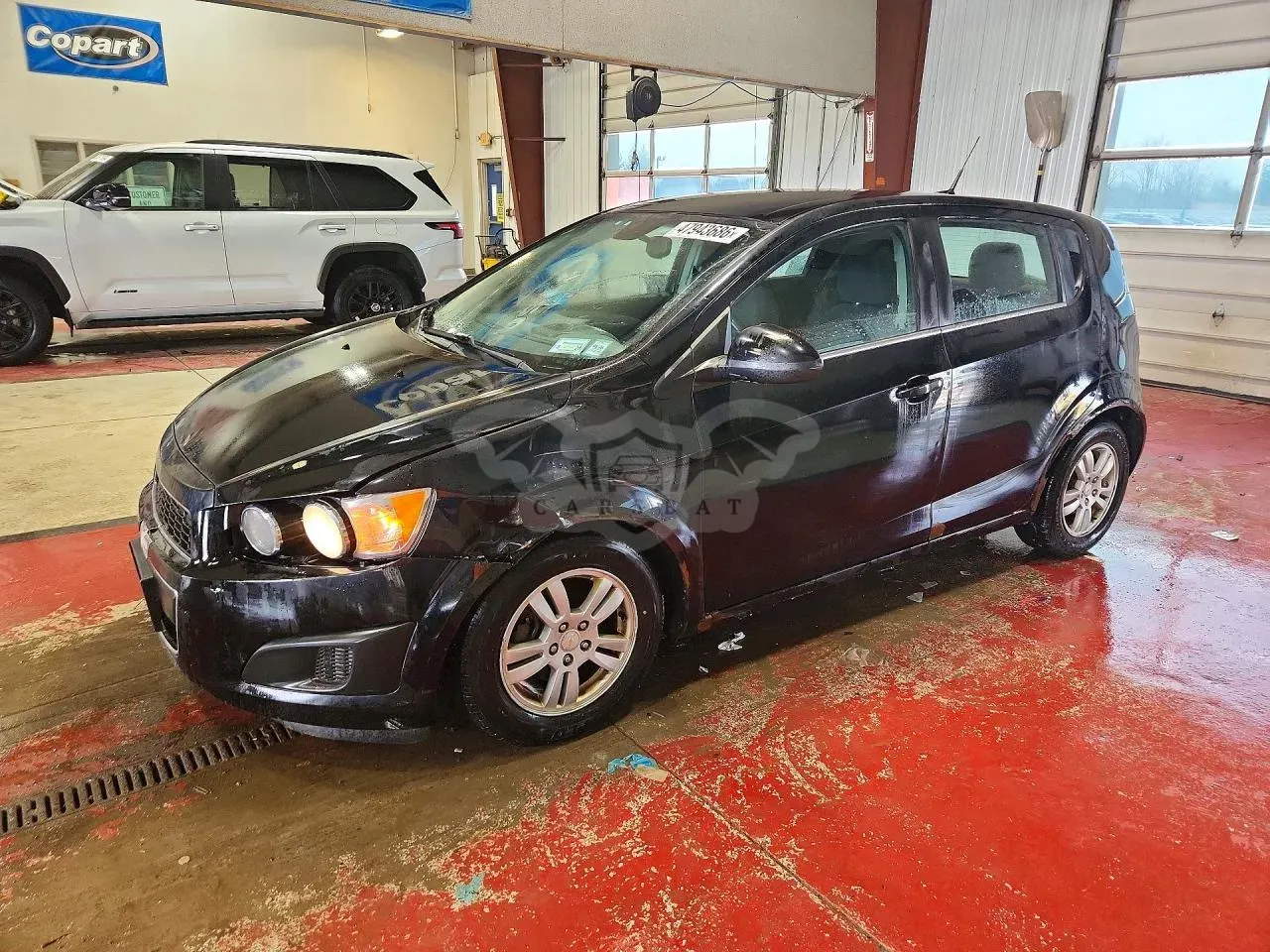 Chevrolet Aveo (Sonic) 1.4L 4 2012