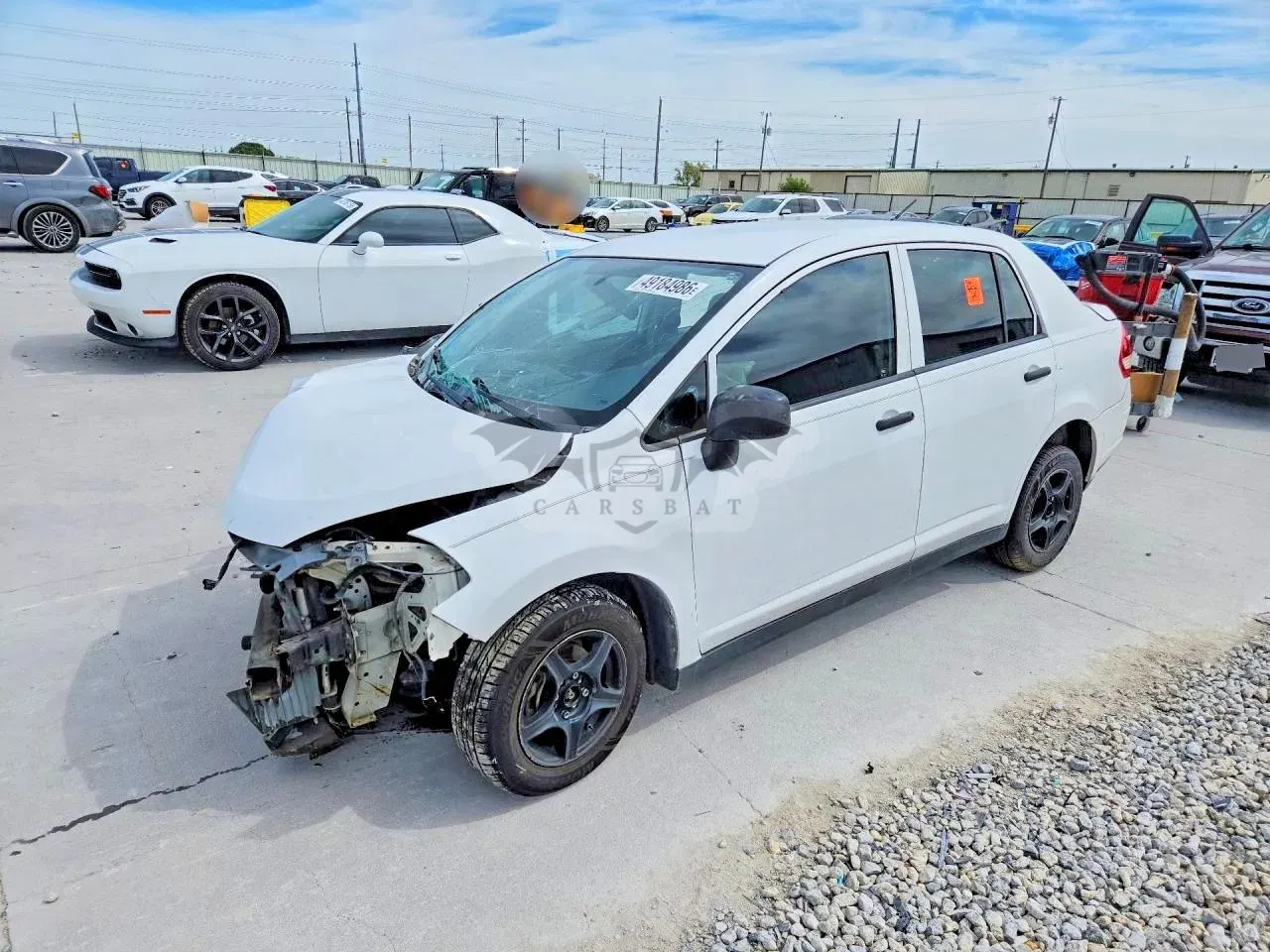 Nissan Versa 1.6L 4 2009