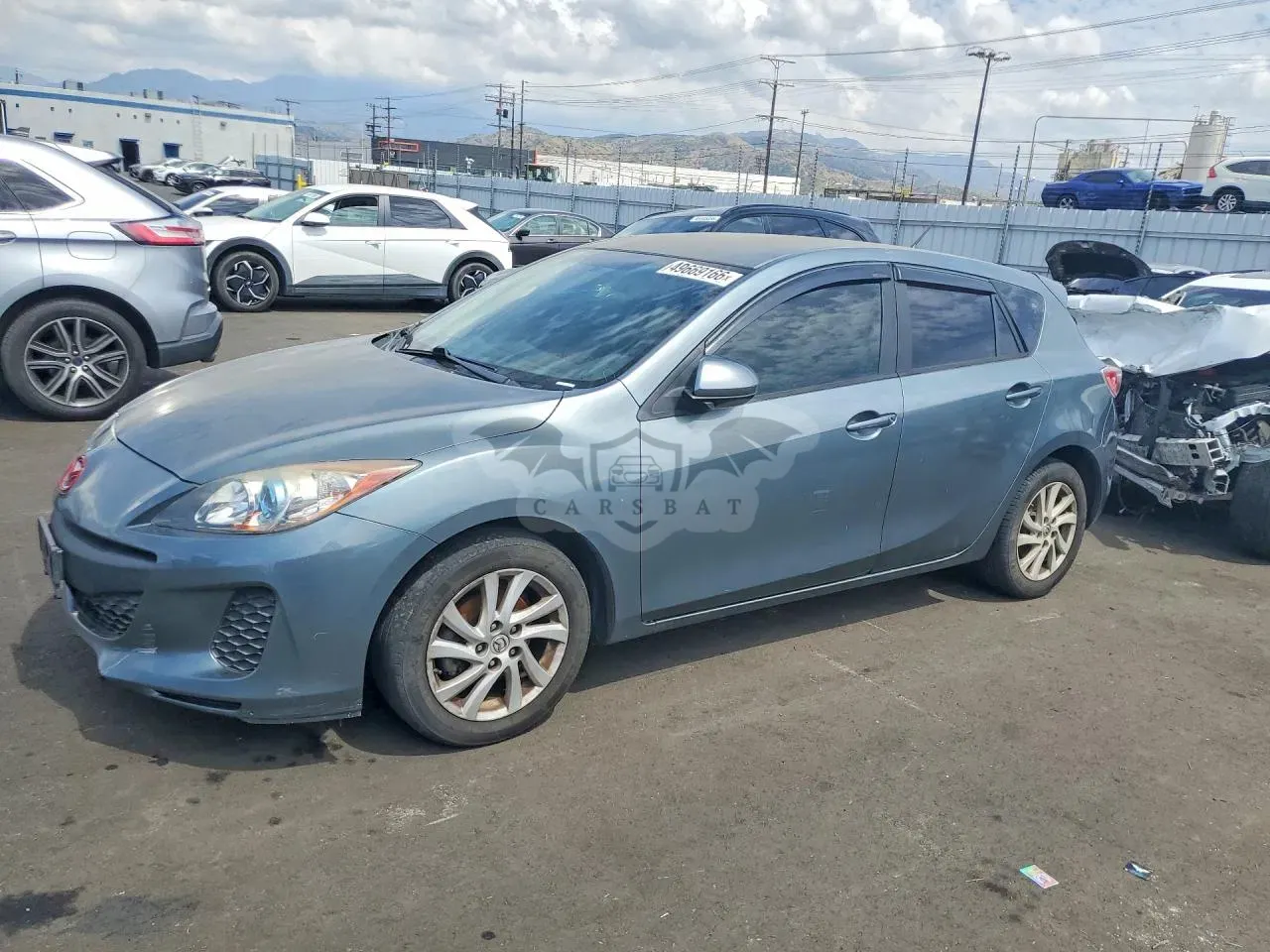 Mazda 3 2.0L 4 2012