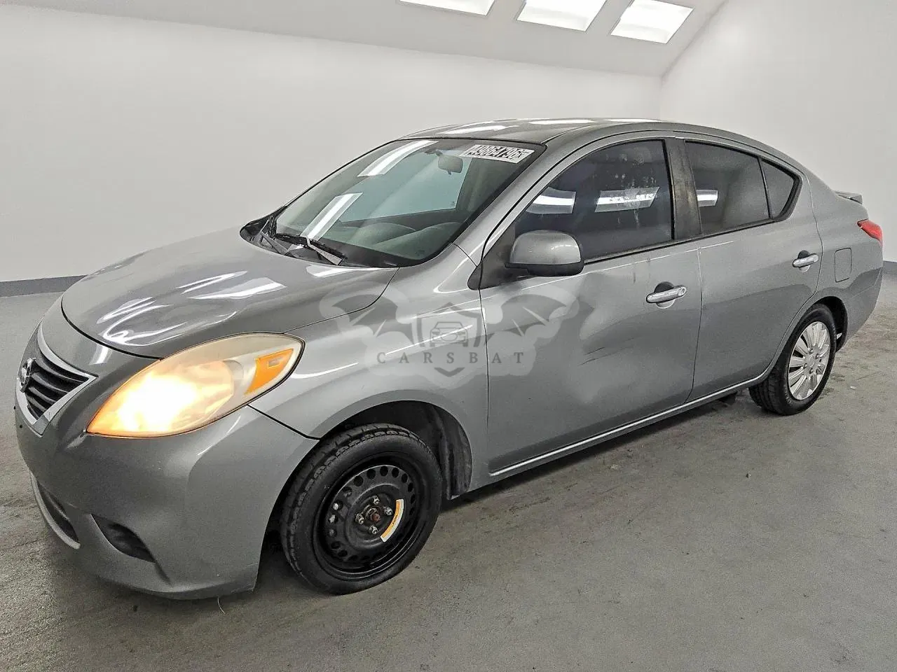 Nissan Versa 1.6L 4 2013