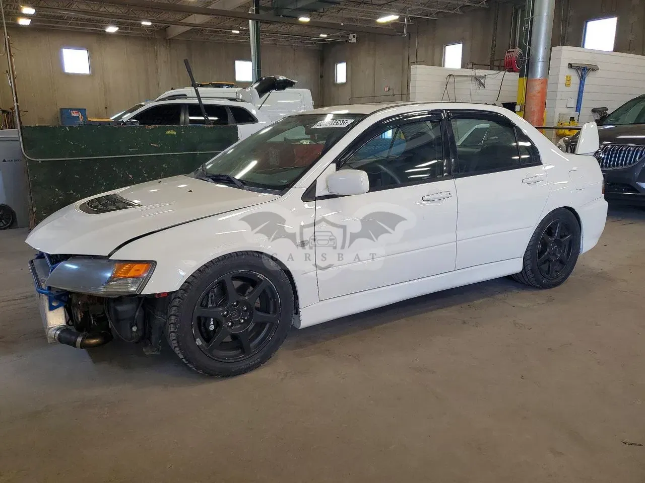 Mitsubishi Lancer 2.0L 4 2003