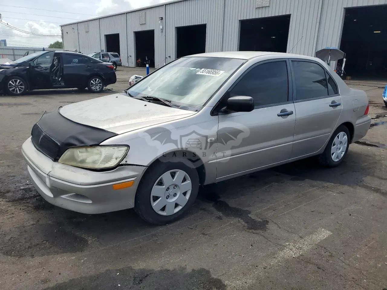 Mitsubishi Lancer 2.0L 4 2003