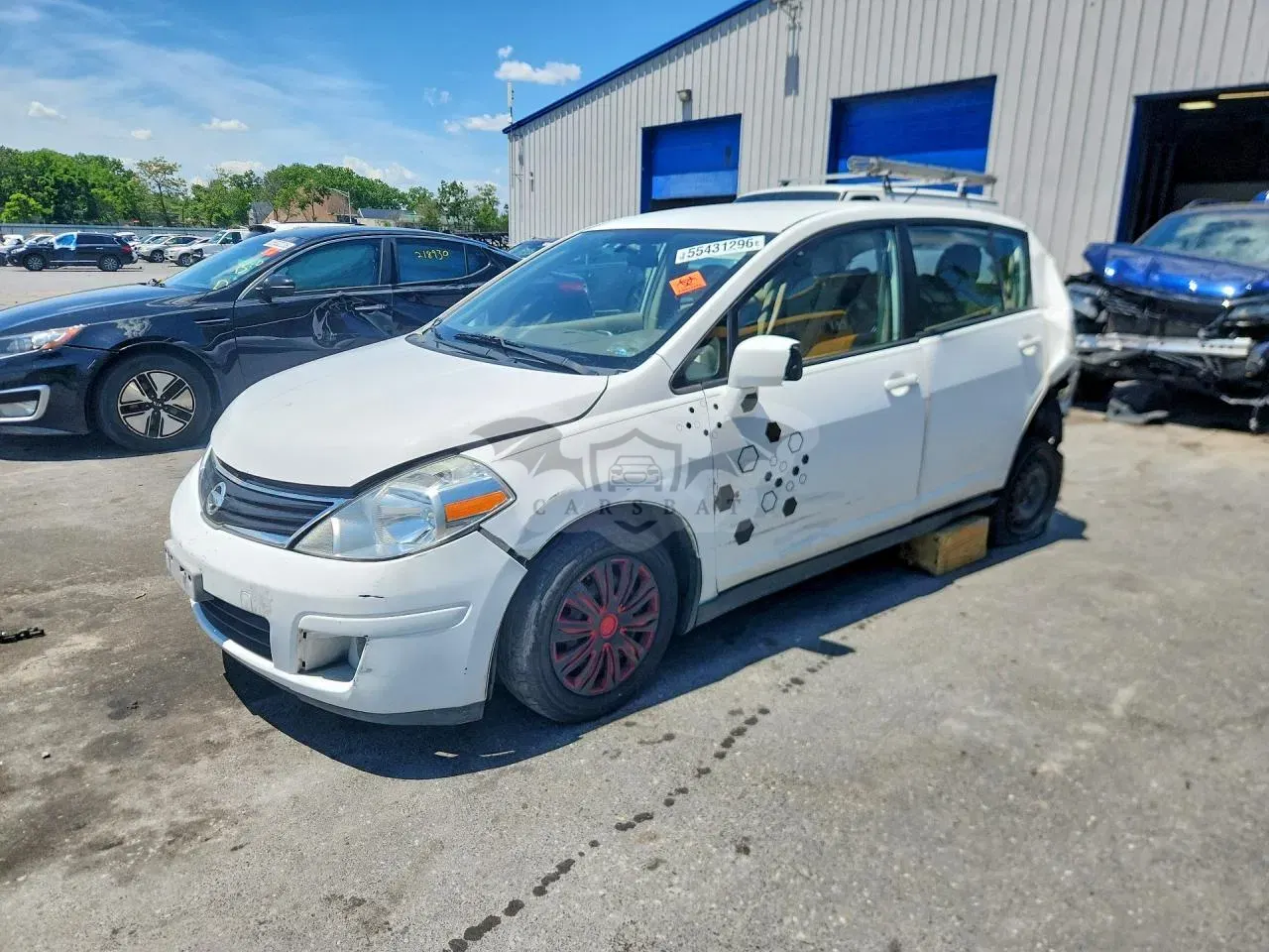 Nissan Versa 1.8L 4 2011