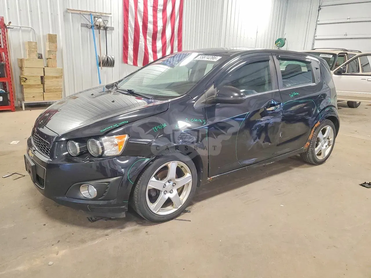 Chevrolet Aveo (Sonic) 1.4L 4 2013