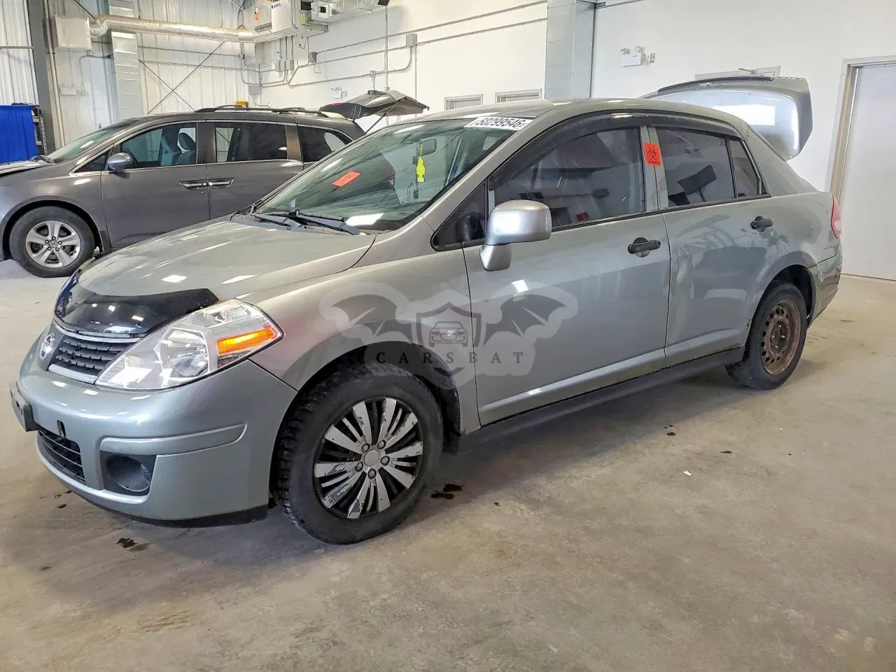 Nissan Versa 1.6L 4 2009