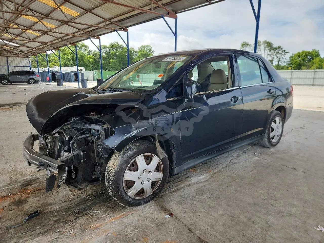 Nissan Versa 1.8L 4 2009