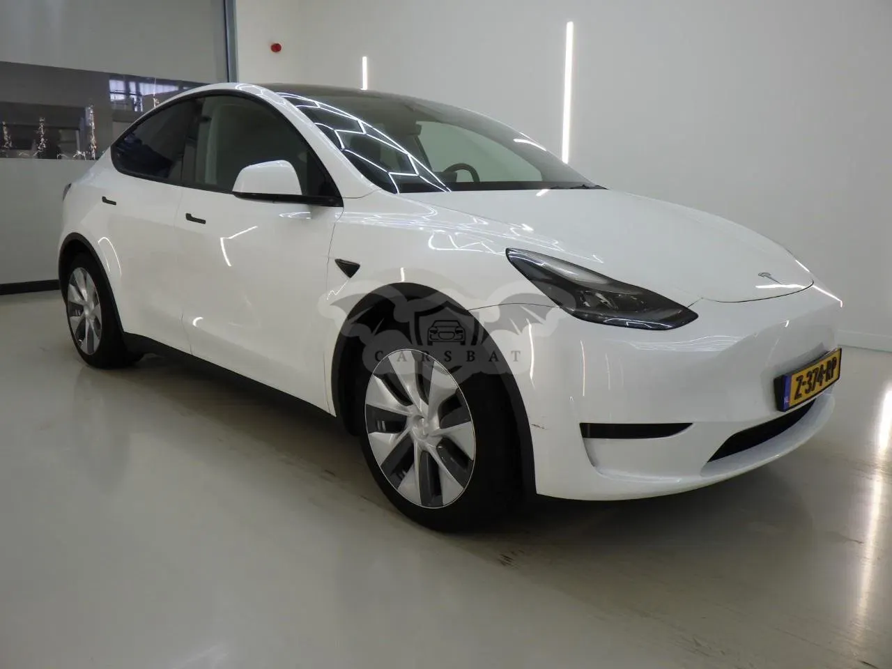 Tesla Model Y 58 kWh 2024