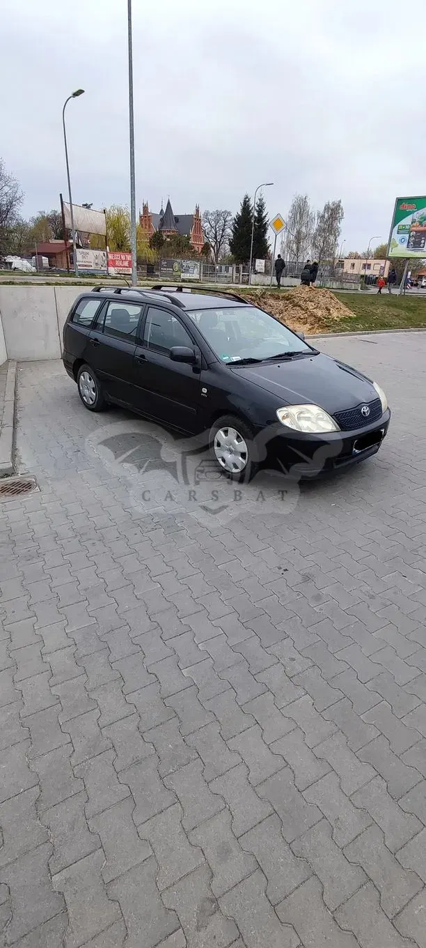Toyota Corolla Seria E12 1.4 VVT-i Base 2002