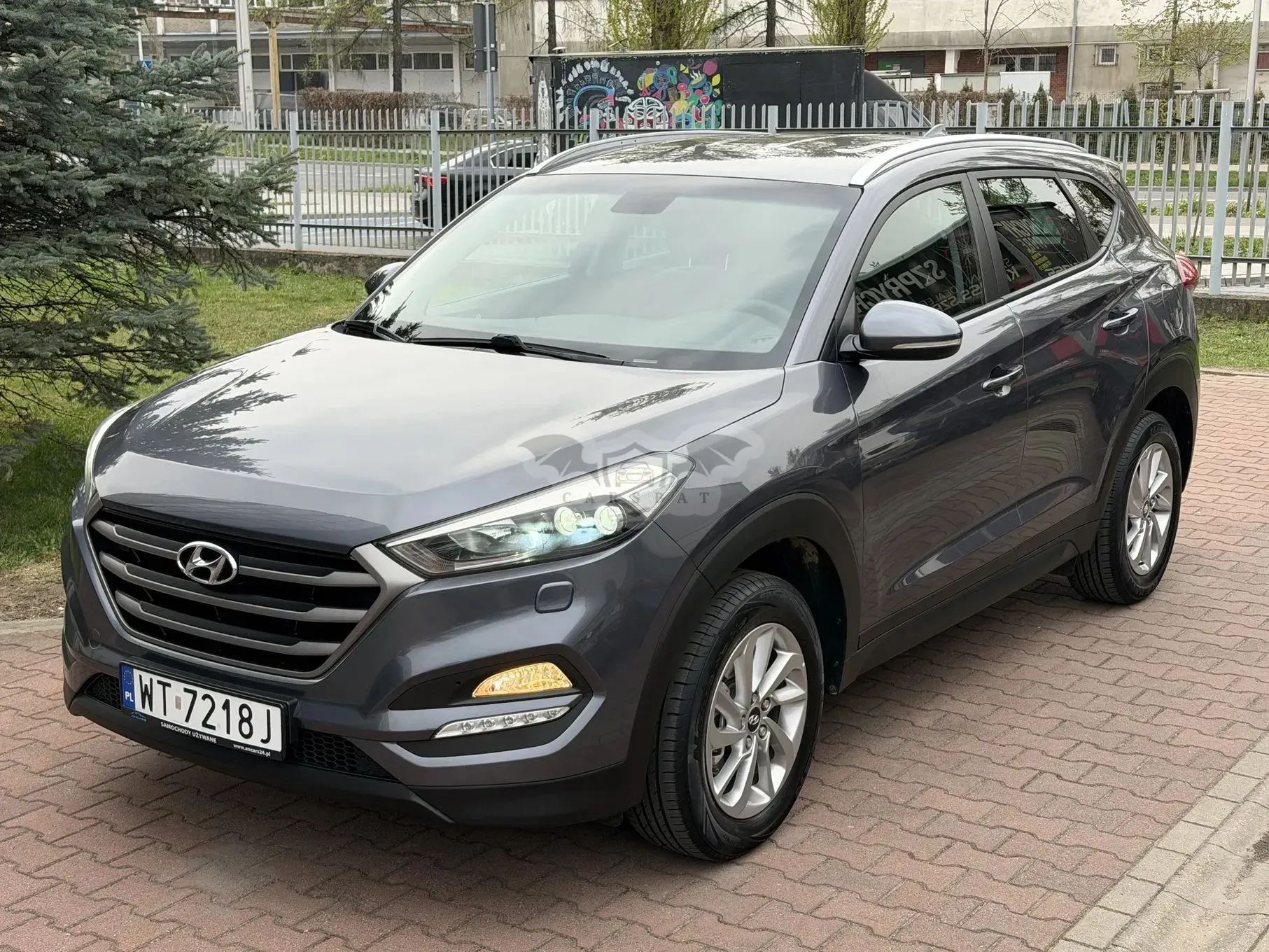 Hyundai Tucson III blue 1.6 GDi 2WD Classic 2015