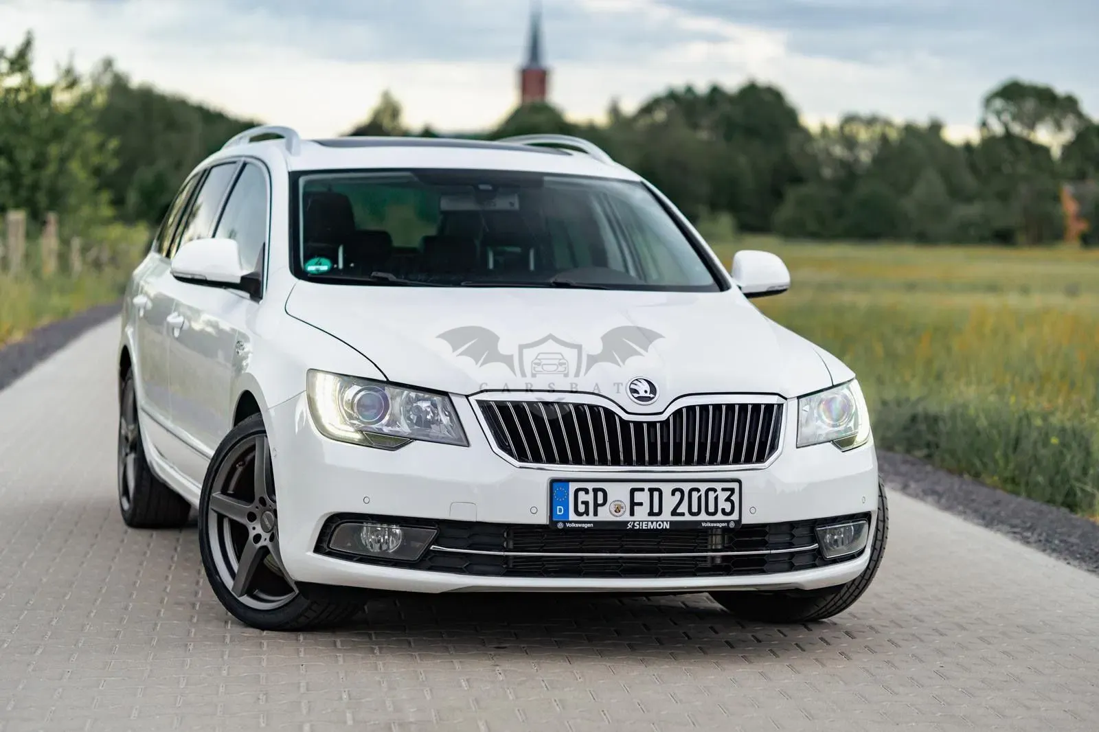 Skoda Superb II 2.0 TDI L&K DSG 2013
