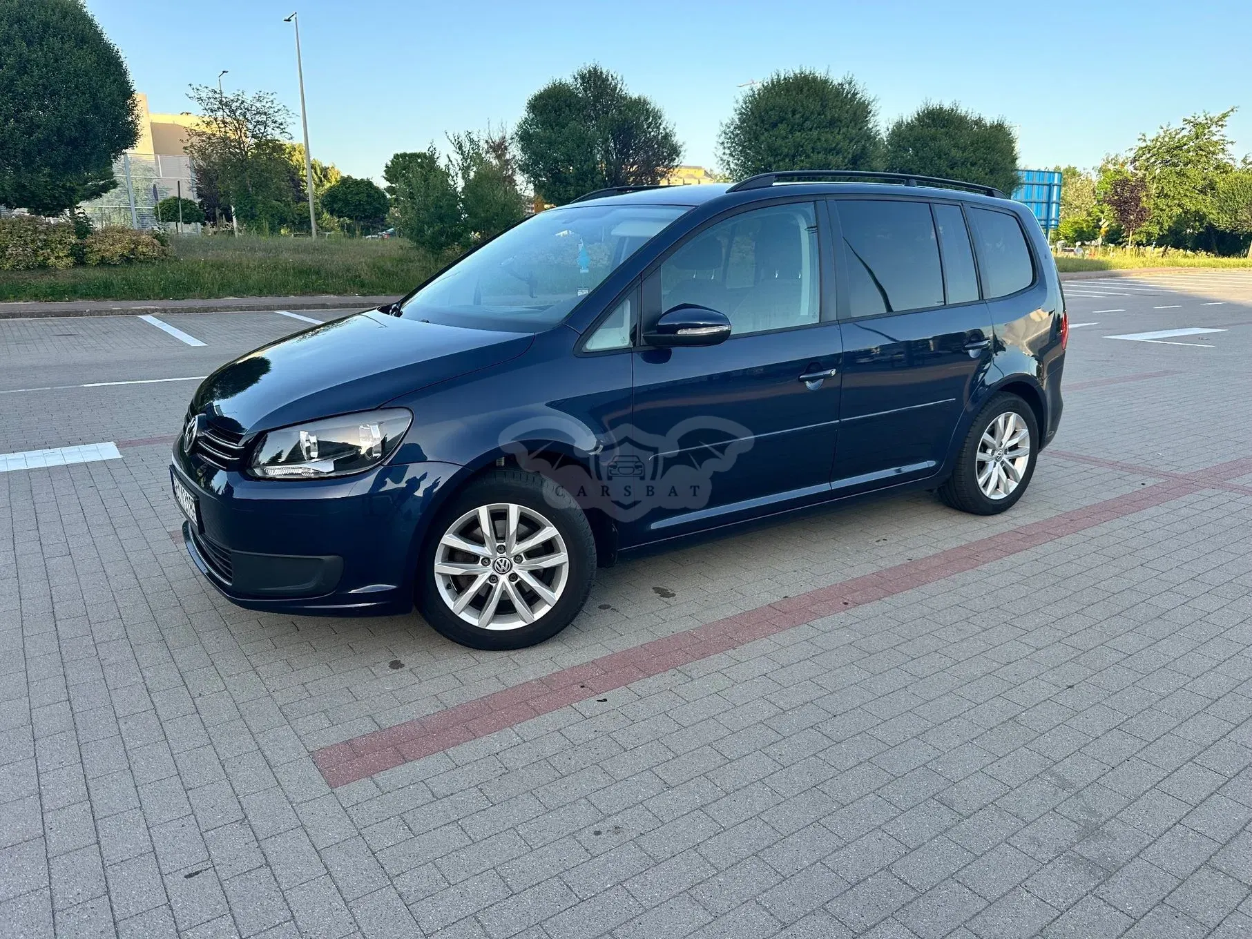 Volkswagen Touran II (2010-2015) 1.6 TDI DPF BlueMotion Technology Comfortline 2012