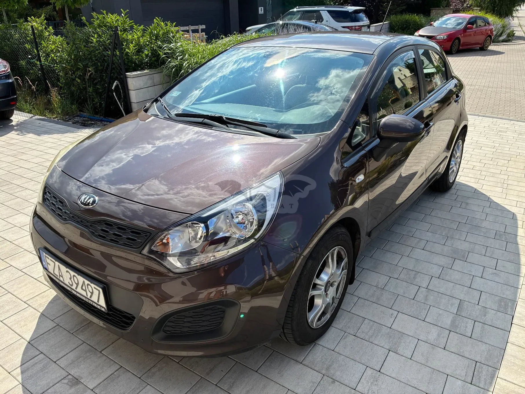 Kia Rio III (2011-) 1.2 M 2013
