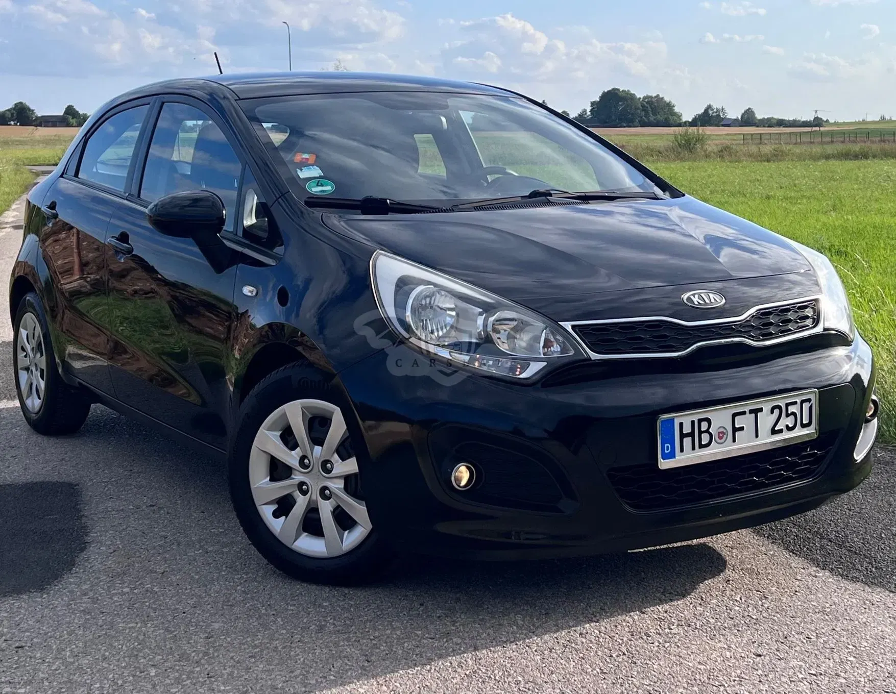 Kia Rio III (2011-) 1.2 Business Line 2013