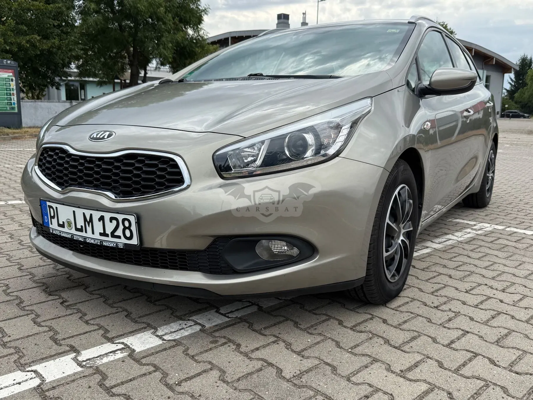 Kia Ceed II (2012-) 1.4 CVVT Dream Team Edition 2013
