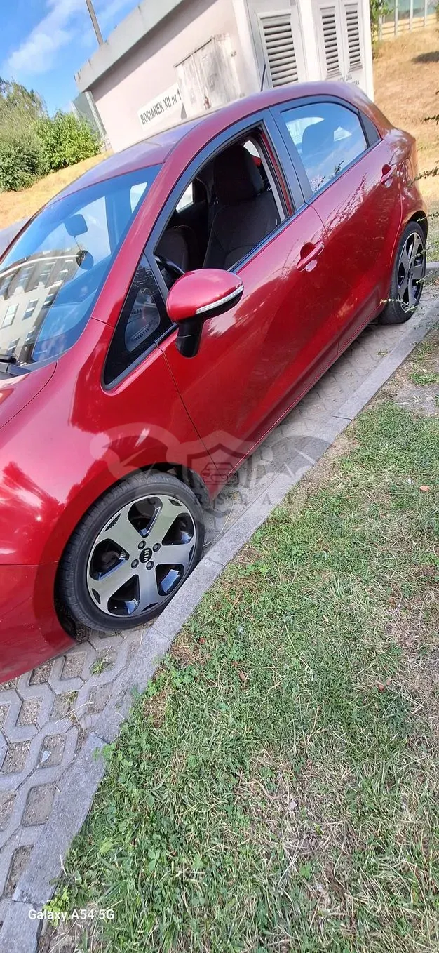 Kia Rio III (2011-) 1.2 M 2013