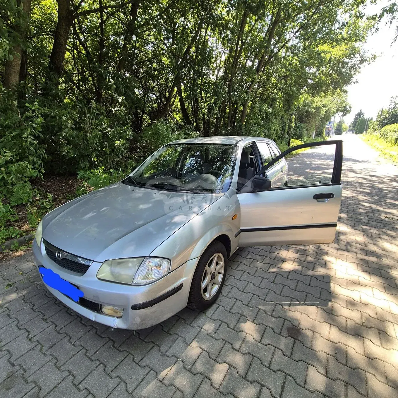 Mazda 323 III (1998-2003) 1999