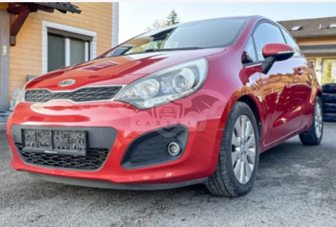 Kia Rio III (2011-) 1.4 CRDI Platinum Edition 2012