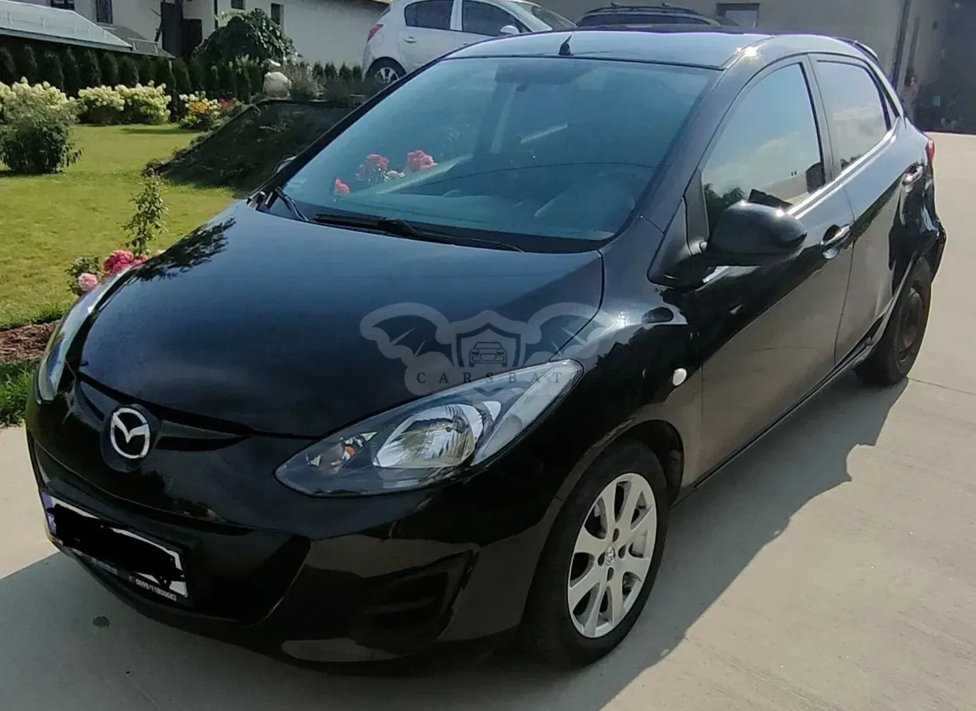 Mazda 2 II (2007-2014) 1.3 Exclusive 2014