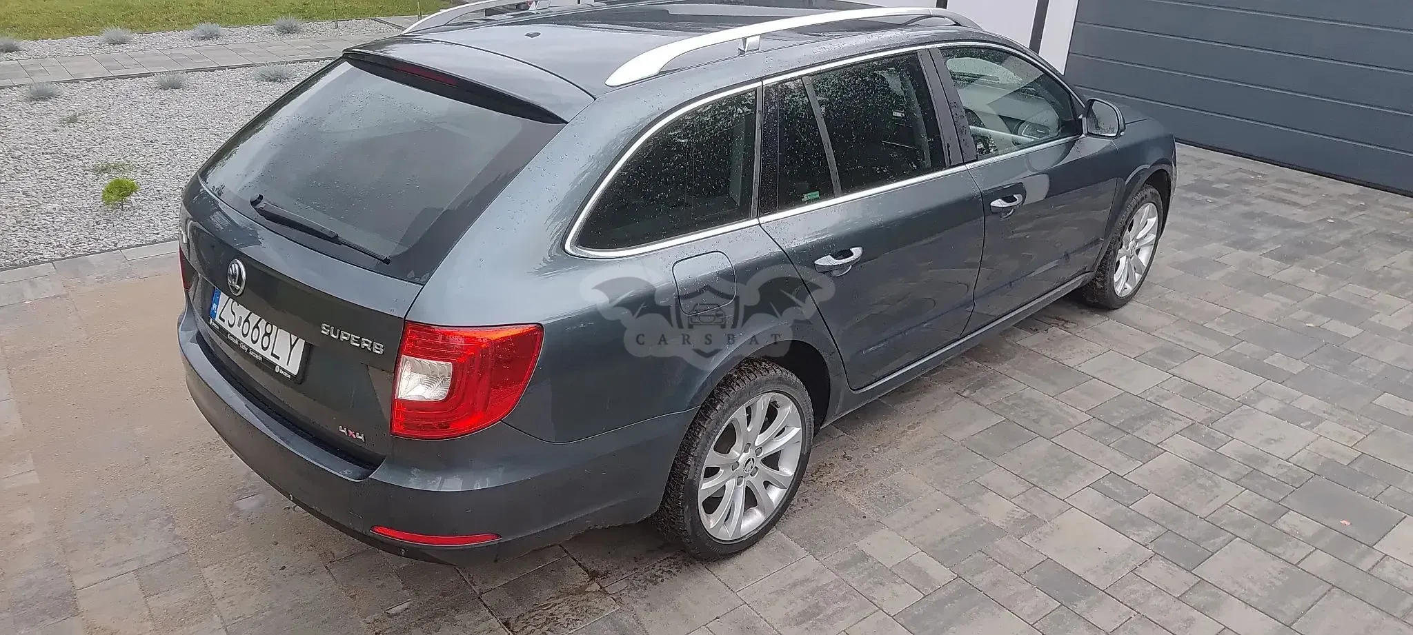 Skoda Superb II (2008-2018) 2.0 TDI 4x4 Ambition DSG 2014