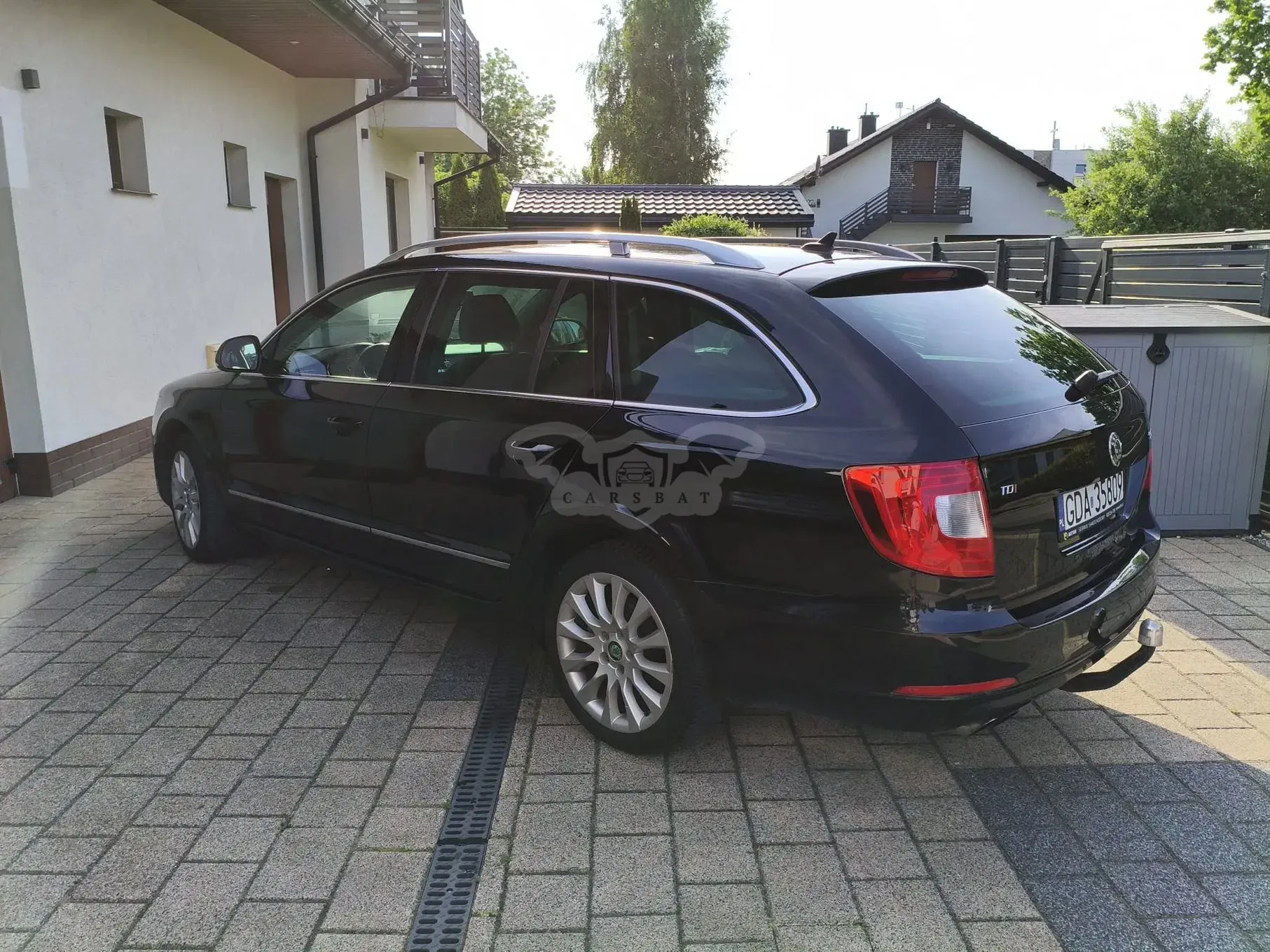 Skoda Superb II (2008-2018) 2.0 TDI Ambition DSG 2012