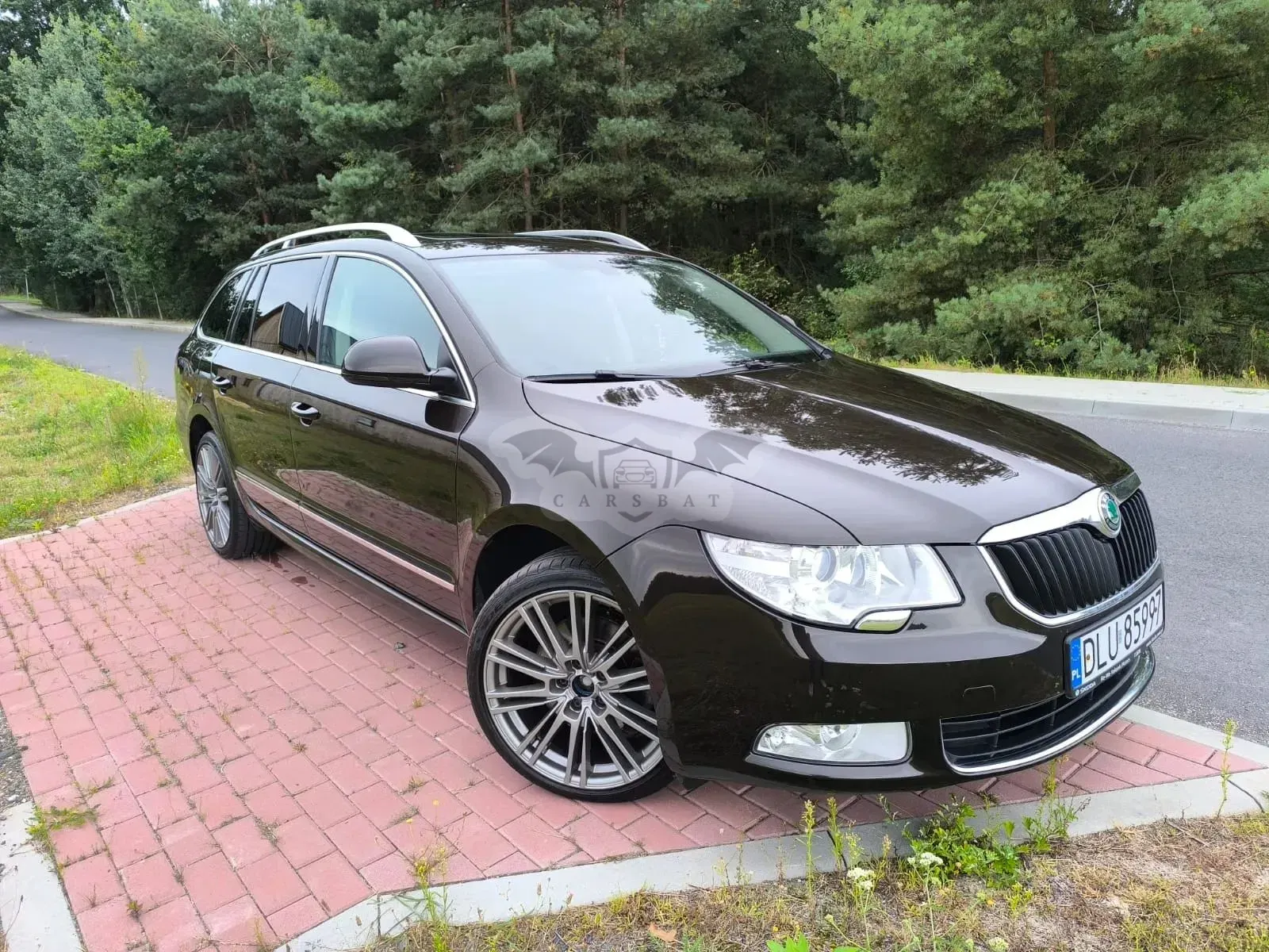 Skoda Superb II (2008-2018) 2.0 TDI 4x4 Ambition DSG 2012