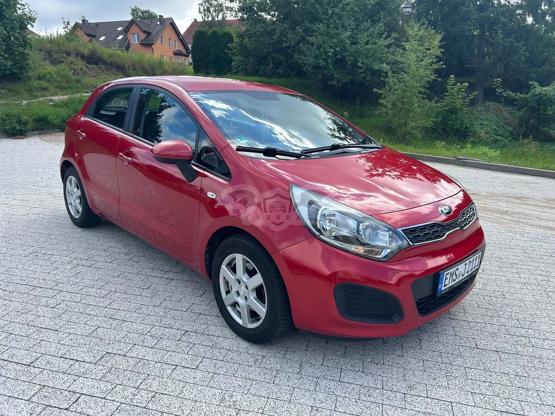 Kia Rio III (2011-) 1.2 M 2013
