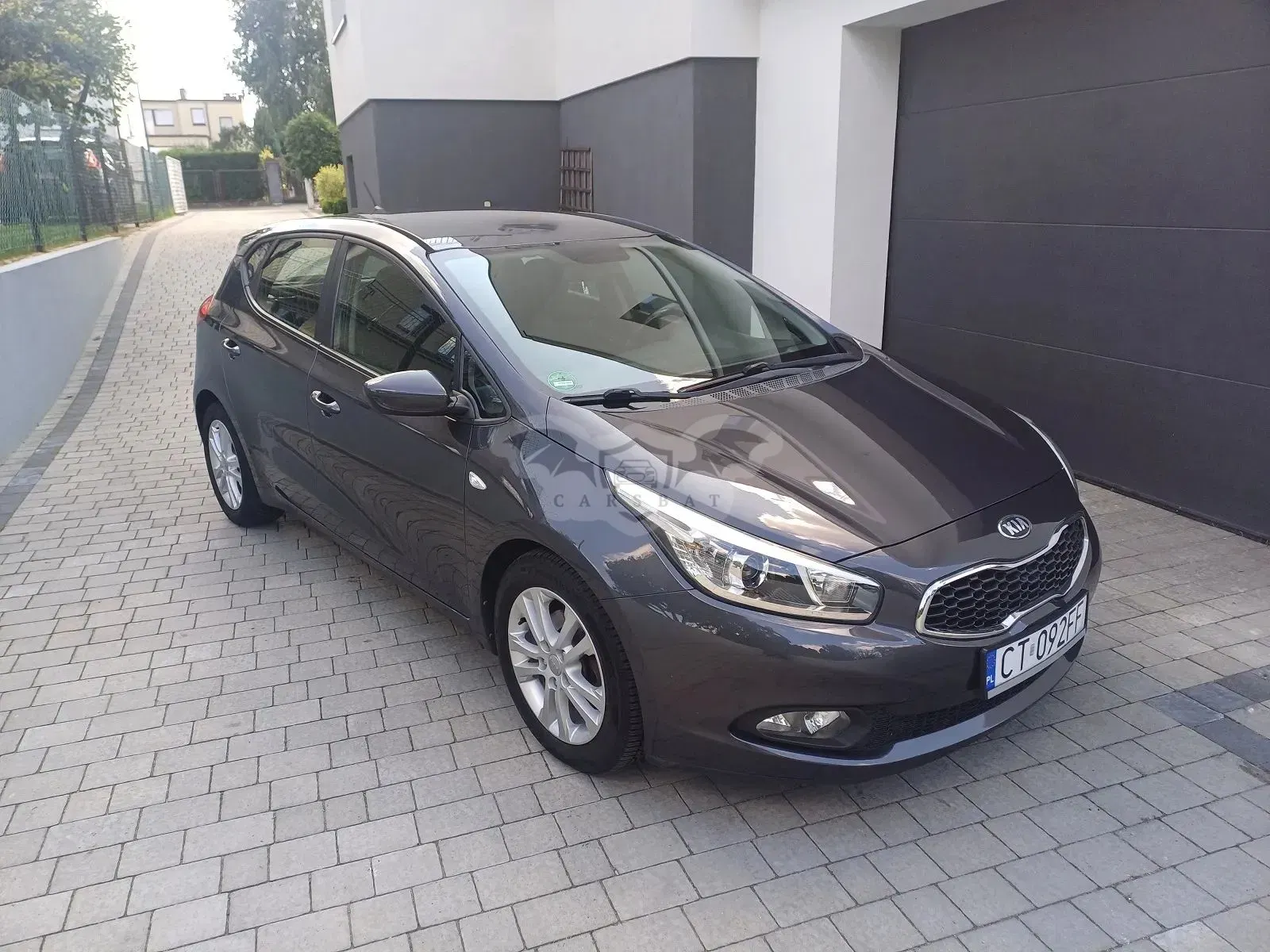 Kia Ceed II (2012-) 1.4 CVVT Dream Team Edition 2012