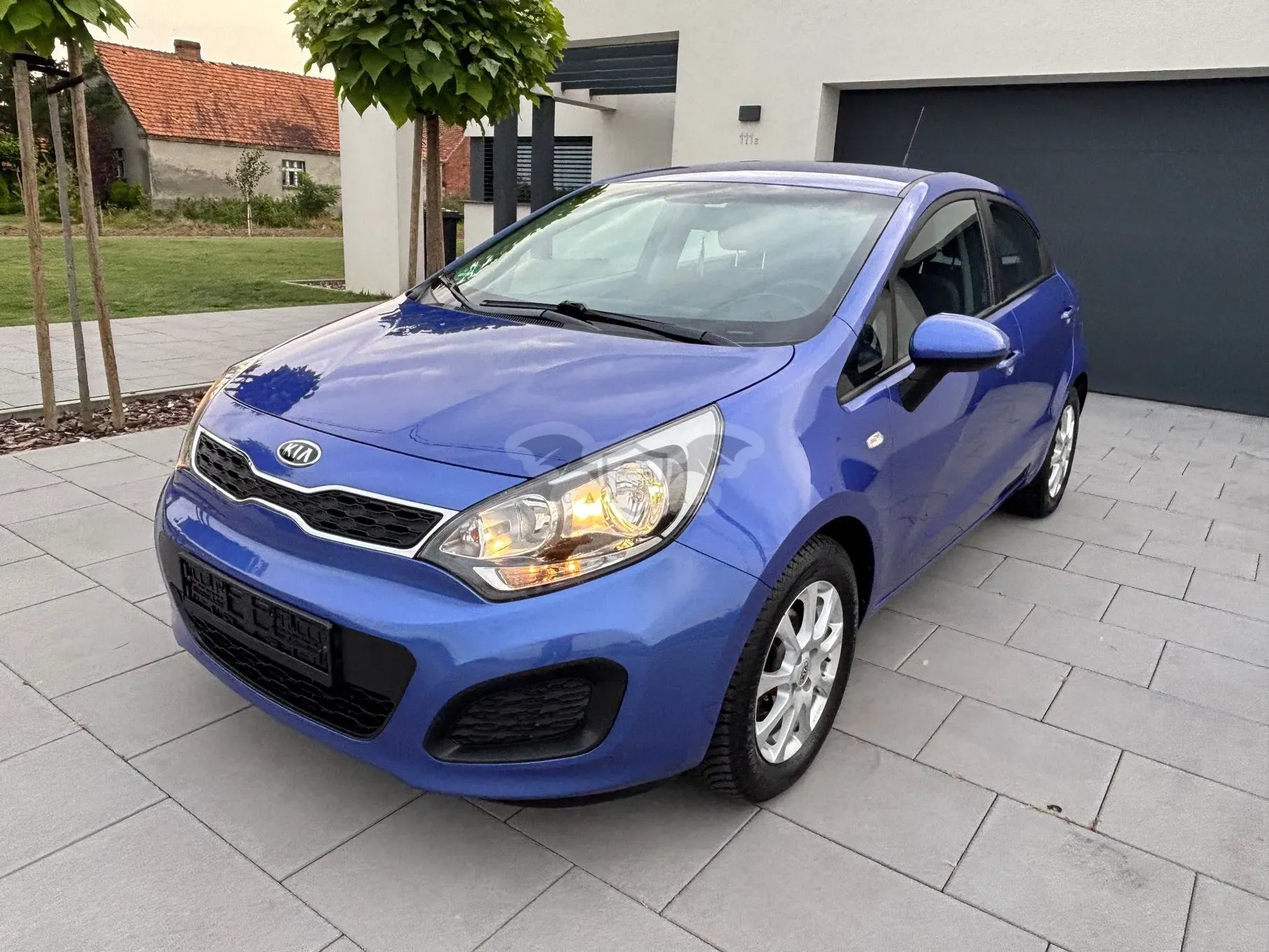 Kia Rio III (2011-) 1.2 Attract 2012