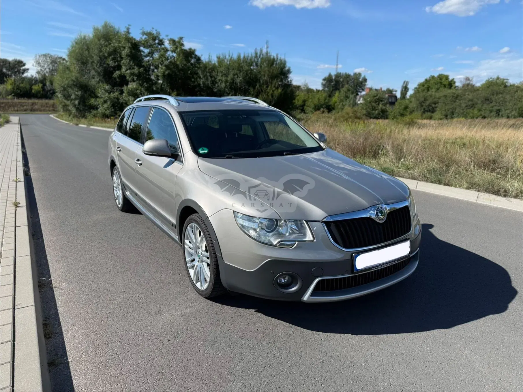 Skoda Superb II (2008-2018) 2.0 TDI Elegance Outdoor DSG 2012
